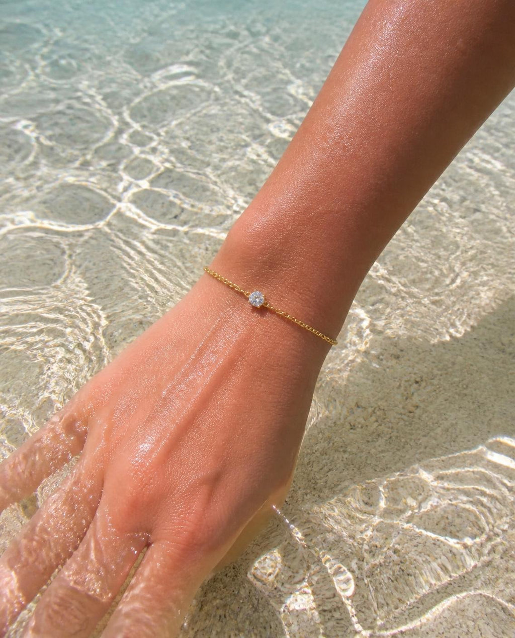 Waterproof Solitaire Chain Bracelet worn in clear sea water