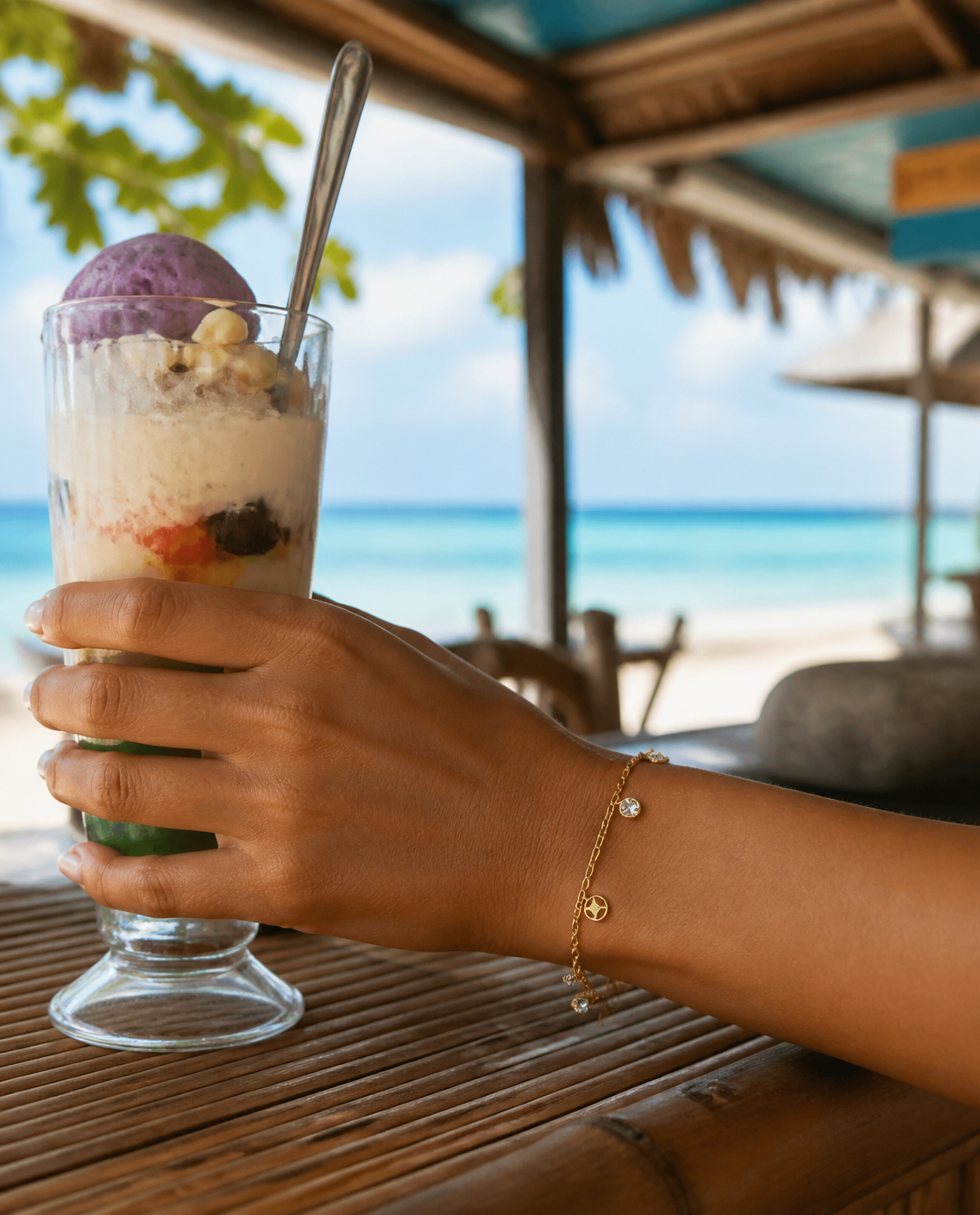 Dangling Charm Bracelet worn holding halo-halo