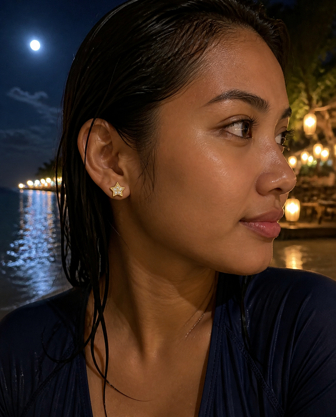 Sparkle Star Stud Earrings worn at night by the water