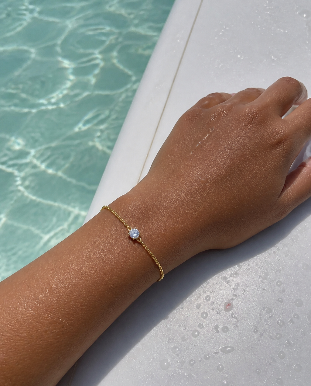 Solitaire Chain Bracelet worn by the water